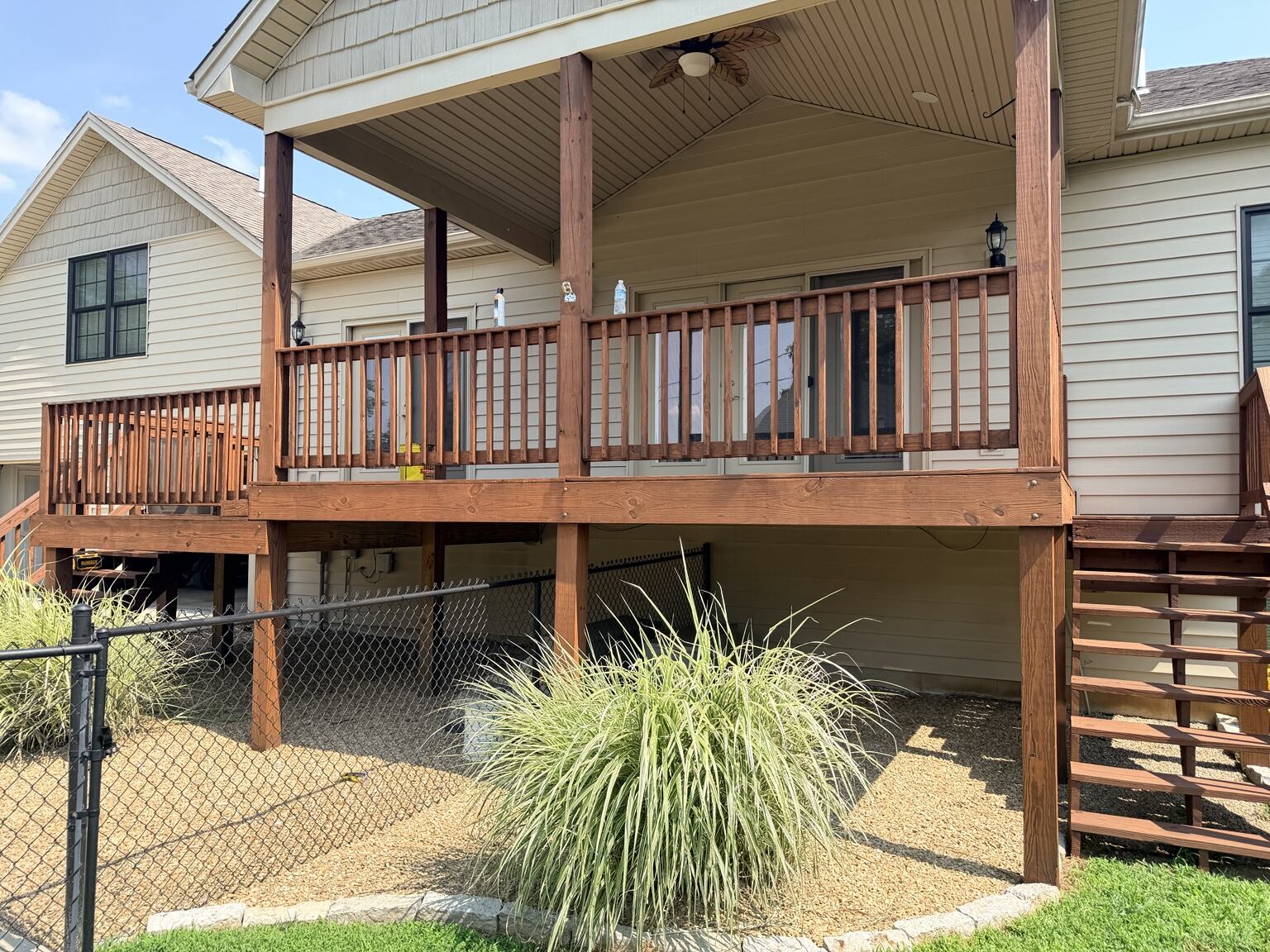Covered deck exterior after deck staining